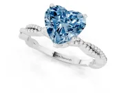 Fancy Blue Heart Cut Diamond Solitaire Ring Set in Silver with Twisted Band and Bead Prong Setting