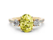 Fancy Yellow Oval Cut Diamond Three-Stone Ring Set in Yellow gold with Pavé Band and Graduated Sides