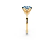 Fancy Blue Oval Cut Diamond Solitaire Engagement Ring Set in Yellow gold with Slim Tapered Solitaire Band
