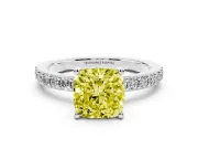 Fancy Yellow Cushion Cut Diamond Solitaire Set in Silver with Round Pavé Band and Prong Setting