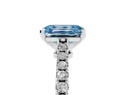 Fancy Blue Emerald Cut Diamond Solitaire Engagement Ring Set in White gold with Delicate Pavé Band and Prong Setting