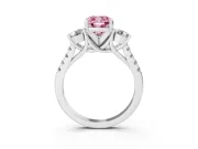 Fancy Pink Three-Stone Cushion Cut Diamond Pavé Band Ring Set in Platinum with Prong-Set Trio