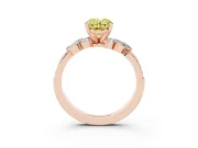 Fancy Yellow Oval Cut Diamond Solitaire Ring Set in Rose gold with Marquise Twist Band and Prong Setting