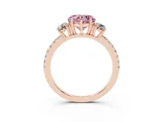 Fancy Pink Heart Cut Diamond Three-Stone Ring Set in Rose gold with Pavé Band and Graduated Sides