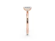 Emerald Cut Diamond Solitaire Ring Set in Rose gold with Prong Setting on a Polished Plain Band