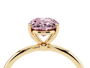 Fancy Pink Oval Cut Diamond Solitaire Engagement Ring Set in Yellow gold with Thin Band and Prong Setting