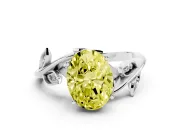 Fancy Yellow Oval Cut Diamond Solitaire Twist Engagement Ring Set in Silver with Pavé Leaf Accents