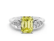 Fancy Yellow Three-Stone Emerald Cut Diamond Ring Set in Silver with Pear Side Stones and Prong Setting