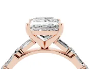 Princess Cut Diamond Solitaire Set in Rose gold with Side Baguettes and Channel Set Band