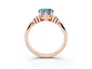 Fancy Blue Three-Stone Heart Cut Diamond Channel Set Ring Set in Rose gold with Bar Prongs