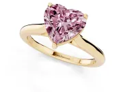 Fancy Pink Heart Cut Diamond Solitaire Ring Set in Yellow gold with Cathedral Band and Prong Setting