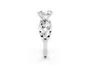 Pear Cut Diamond Solitaire Ring Set in White gold with Side Stones on Criss-Cross Band and Prong Setting