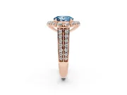 Fancy Blue Oval Cut Diamond Halo Engagement Ring Set in Rose gold with Split Shank and Prong Setting