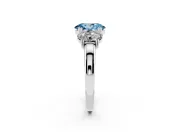 Fancy Blue Oval Cut Diamond Three-Stone Ring Set in White gold with Polished Band and Prong Setting