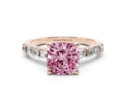 Fancy Pink Cushion Cut Diamond Solitaire Set in Rose gold with Side Baguettes and Channel Set Band