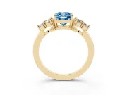 Fancy Blue Cushion Cut Diamond Solitaire Ring Set in Yellow gold with Cluster Accents on Each Side