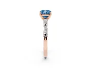 Fancy Blue Cushion Cut Diamond Solitaire Set in Rose gold with Side Baguettes and Channel Set Band