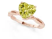 Fancy Yellow Heart Cut Diamond Solitaire Ring Set in Rose gold with Twisted Band and Bead Prong Setting