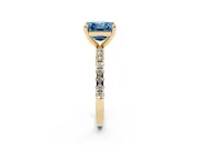 Fancy Blue Asscher Cut Diamond Brilliant Solitaire Ring Set in Yellow gold with Pavé Band and Prong Setting
