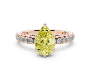 Fancy Yellow Pear Cut Diamond Pavé Solitaire Ring Set in Rose gold with Round Band and Prong Setting