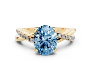 Oval Twist Engagement Ring Setting for a Fancy Blue Lab-Grown Diamond | Crossover Band | Yellow Gold
