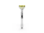 Fancy Yellow Emerald Cut Diamond Solitaire Ring Set in White gold with Tapered Baguette Side Stones and Prong Setting