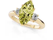 Fancy Yellow Three-Stone Marquise Cut Diamond Ring Set in Yellow gold with Prong Setting and Plain Band