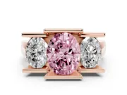 Fancy Pink Oval Cut Diamond Three-Stone Channel Set Ring Set in Rose gold with Smooth Polished Band