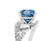 Fancy Blue Princess Cut Diamond Solitaire Ring Set in Platinum with Pavé Twist Band and Secure Prong Setting
