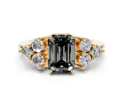Fancy Black Emerald Cut Diamond Solitaire Ring Set in Yellow gold with Cluster Accents on Each Side