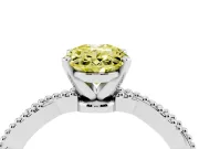 Fancy Yellow Oval Cut Diamond Solitaire Ring Set in Silver with Twisted Band and Bead Prong Setting