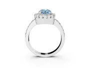 Fancy Blue Oval Cut Diamond Halo Ring Set in White gold with Pavé Shank and Prong Setting