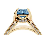 Fancy Blue Emerald Cut Diamond Pavé Split Shank Solitaire Ring Set in Yellow gold with Prong Setting