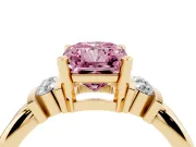 Fancy Pink Three-Stone Radiant Cut Diamond Channel Set Ring Set in Yellow gold with Bar Prongs