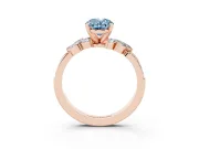 Fancy Blue Oval Cut Diamond Solitaire Ring Set in Rose gold with Marquise Twist Band and Prong Setting