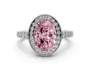 Fancy Pink Oval Cut Diamond Milgrain Halo Solitaire Ring Set in Platinum with Bezel Set Side Stones and Pavé Band