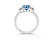 Fancy Blue Round Cut Diamond Three-Stone Ring Set in White gold with Pavé Band and Graduated Sides