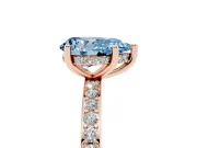 Fancy Blue Pear Cut Diamond Pavé Band Ring Set in Rose gold with Prong-Set Center Stone