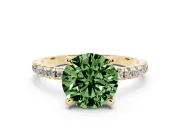Fancy Green Round Cut Diamond Brilliant Solitaire Ring Set in Yellow gold with Pavé Band and Prong Setting