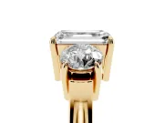 Emerald Cut Three Stone Engagement Ring Setting | Round Side Stones and Open Baskets | Yellow Gold