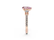 Fancy Pink Three-Stone Pear Cut Diamond Pavé Band Ring Set in Rose gold with Prong Setting