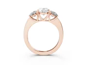 Oval Cut Diamond Three-Stone Ring Set in Rose gold with Bold Center and Classic Band