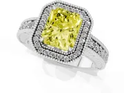 Fancy Yellow Radiant Cut Diamond Halo Ring Set in White gold with Round Accent Halo, Pavé Band and Prong Setting