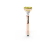 Fancy Yellow Emerald Cut Diamond Solitaire Ring Set in Rose gold with Tapered Baguette Side Stones and Prong Setting