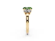 Fancy Green Oval Cut Diamond Three-Stone Ring Set in Yellow gold with Polished Band and Prong Setting