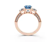 Fancy Blue Cushion Cut Diamond Three-Stone Ring Set in Rose gold with Round Side Stones and Pavé Band