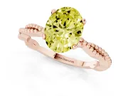 Fancy Yellow Oval Cut Diamond Solitaire Ring Set in Rose gold with Twisted Band and Bead Prong Setting