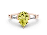 Fancy Yellow Pear Cut Diamond Solitaire Ring Set in Rose gold with Tapered Baguette Accents and Prong Setting