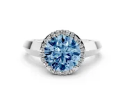 Fancy Blue Round Cut Diamond Halo Ring Set in Silver with Cathedral Band and Prong Setting