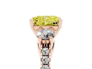 Fancy Yellow Three-Stone Radiant Cut Diamond Pavé Band Ring Set in Rose gold with Prong-Set Trio
